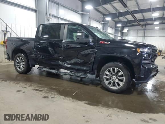 2021 Chevrolet Silverado 1500 RST with VIN 1GCUYEEL7MZ295884, listed as a Copart auction lot 82228385 with 82,797 mi miles and Salvage title. Bid and sale history available at DreamBid. Image 4.