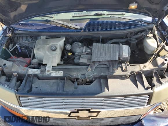 2004 Chevrolet Express Passenger with VIN 1GBFG15T841139909, listed as a Copart auction lot 67942615 with 179,684 mi miles and Salvage title. Bid and sale history available at DreamBid. Image 12.