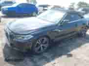 2023 BMW 4 Series 430i with VIN WBA23AT03PCL58295, listed as a IAAI auction lot 43164347 with 60,641 mi miles and . Bid and sale history available at DreamBid. Image 2.