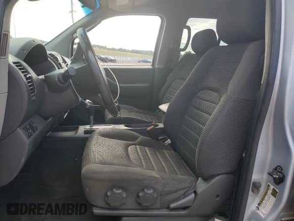 2007 Nissan Frontier SE z VIN 1N6AD07W57C428056, wystawiony jako Copart lot #67473095 z przebiegiem 119 662 mil mil oraz Szkoda całkowita • Salvage title. Historia ofert i sprzedaży dostępna na DreamBid. Obrazek 7.