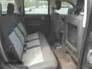 2010 Dodge Nitro SE with VIN 1D4PT2GK5AW124730, listed as a Copart auction lot 49146165 with 142,706 mi miles and Salvage title. Bid and sale history available at DreamBid. Image 11.