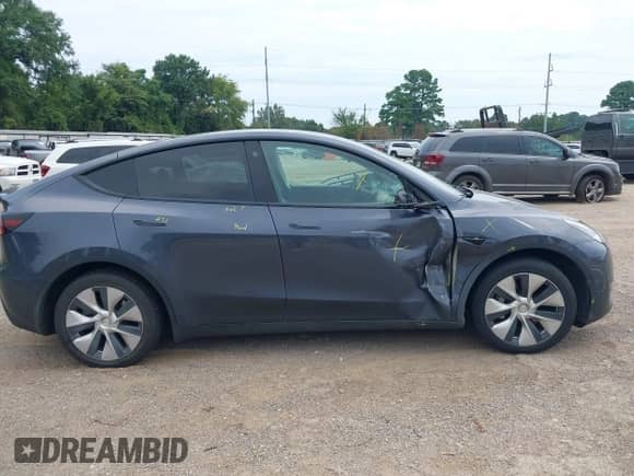 2021 Tesla Model Y Long Range with VIN 5YJYGDEE1MF217624, listed as a IAAI auction lot 42842945 with 58,610 mi miles and . Bid and sale history available at DreamBid. Image 6.