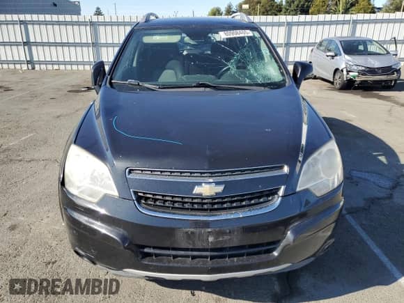 2014 Chevrolet Captiva Sport LT с VIN 3GNAL3EK6ES563956, выставлен на аукционе Copart как лот 80908465 с пробегом 183 083 миль миль и Списание • Salvage title. История ставок и продаж доступна на DreamBid. Изображение 5.