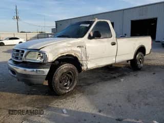 1999 Ford F-150 z VIN 2FTZF1824XCB16967, wystawiony jako Copart lot #42795085 z przebiegiem Nie podano mil oraz Szkoda całkowita • Salvage title. Historia ofert i sprzedaży dostępna na DreamBid. Obrazek 1.