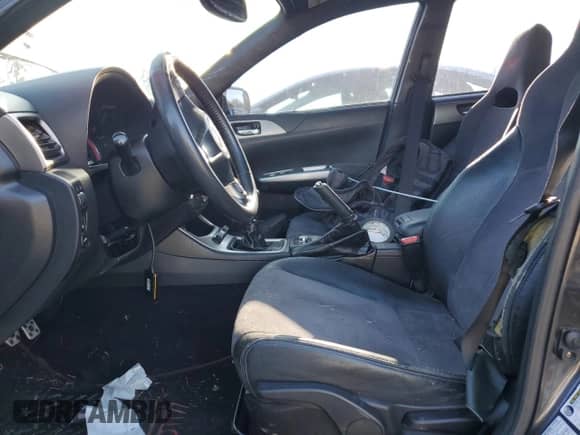 2009 Subaru WRX STI with VIN JF1GR896X9L802972, listed as a Copart auction lot 87186164 with 160,838 mi miles and Salvage title. Bid and sale history available at DreamBid. Image 7.