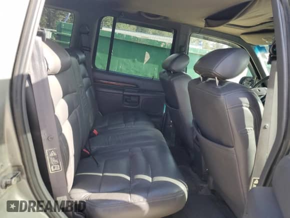 2000 Ford Explorer Limited with VIN 1FMDU75E9YUB50157, listed as a Copart auction lot 88743875 with 184,376 mi miles and Salvage title. Bid and sale history available at DreamBid. Image 11.