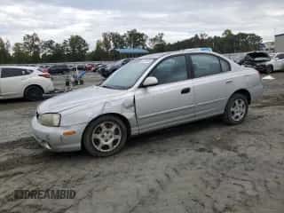 2003 Hyundai Elantra GLS with VIN KMHDN45D43U680564, listed as a Copart auction lot 82258605 with 183,682 mi miles and Salvage title. Bid and sale history available at DreamBid. Image 1.