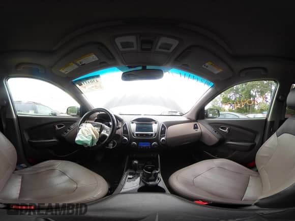 2012 Hyundai Tucson GLS with VIN KM8JU3ACXCU519889, listed as a IAAI auction lot 43041175 with 157,398 mi miles and . Bid and sale history available at DreamBid. Image 18.