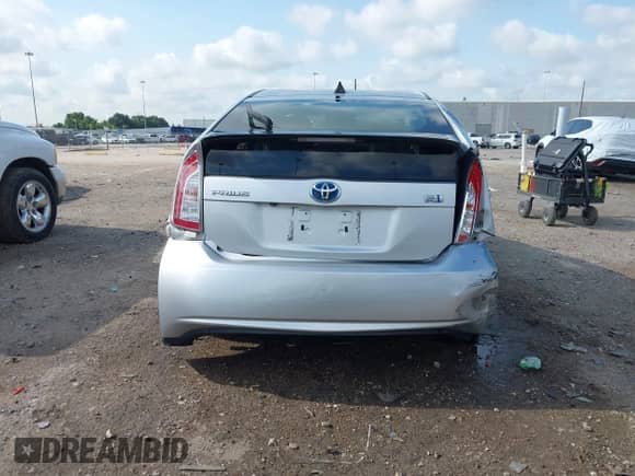 2015 Toyota Prius Three z VIN JTDKN3DU1F1924457, wystawiony jako IAAI lot #42927648 z przebiegiem 101 372 mil mil oraz . Historia ofert i sprzedaży dostępna na DreamBid. Obrazek 16.