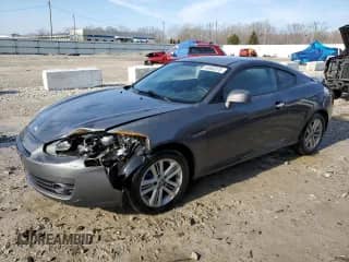 2007 Hyundai Tiburon GS с VIN KMHHM66D47U256547, выставлен на аукционе Copart как лот 44063375 с пробегом 191 443 миль миль и На запчасти • Non repairable. История ставок и продаж доступна на DreamBid. Изображение 1.