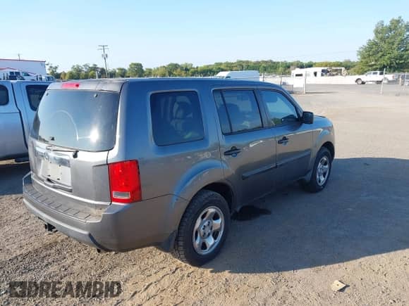 2011 Honda Pilot LX with VIN 5FNYF3H2XBB010368, listed as a IAAI auction lot 43209773 with 208,973 mi miles and . Bid and sale history available at DreamBid. Image 4.