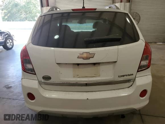2013 Chevrolet Captiva Sport LT с VIN 3GNAL3EK4DS601408, выставлен на аукционе Copart как лот 77042154 с пробегом 125 288 миль миль и Чистый • Clean title. История ставок и продаж доступна на DreamBid. Изображение 6.