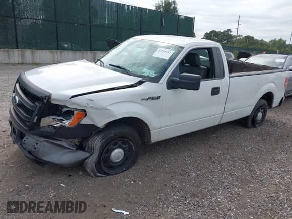 2013 Ford F-150 XL with VIN 1FTMF1CMXDKF34251, listed as a IAAI auction lot 43194182 with 179,900 mi miles and . Bid and sale history available at DreamBid. Image 2.
