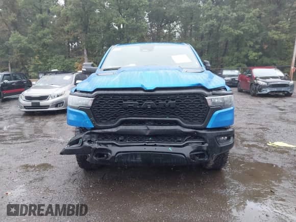 2025 Ram 1500 Rebel z VIN 1C6SRFLP0SN578395, wystawiony jako IAAI lot #43230495 z przebiegiem 32 399 mil mil oraz . Historia ofert i sprzedaży dostępna na DreamBid. Obrazek 12.