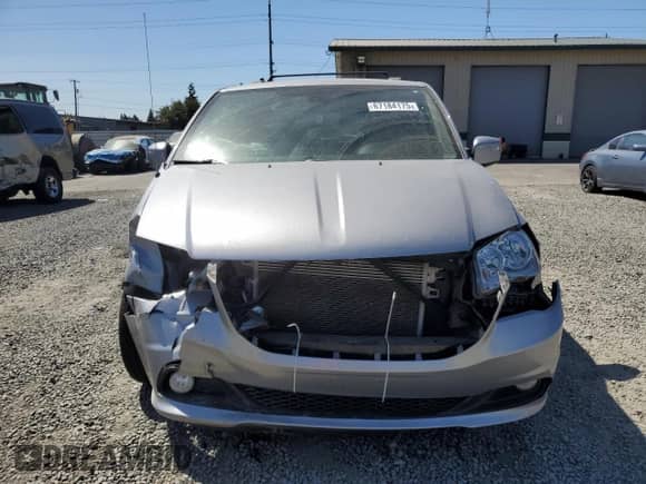 2018 Dodge Grand Caravan SXT with VIN 2C4RDGCGXJR282636, listed as a Copart auction lot 67184175 with 99,430 mi miles and Salvage title. Bid and sale history available at DreamBid. Image 5.
