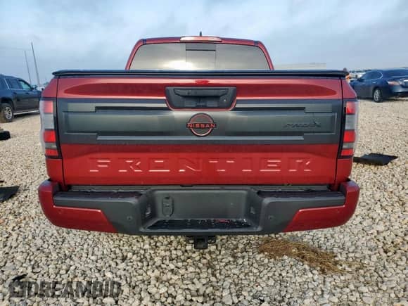 2025 Nissan Frontier Pro-X with VIN 1N6ED1EJXSN637854, listed as a Copart auction lot 65409335 with 2,410 mi miles and Salvage title. Bid and sale history available at DreamBid. Image 6.