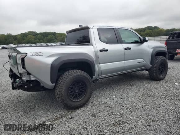 2024 Toyota Tacoma SR5 with VIN 3TYLB5JN8RT060119, listed as a Copart auction lot 83873505 with 25 mi miles and Salvage title. Bid and sale history available at DreamBid. Image 3.
