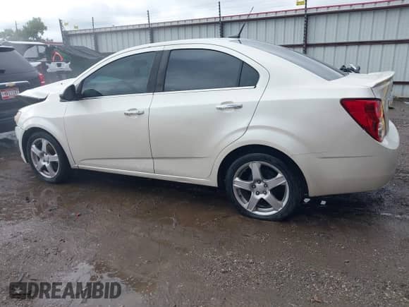 2014 Chevrolet Sonic LTZ with VIN 1G1JE5SB5E4122735, listed as a IAAI auction lot 42327595 with 163,912 mi miles and . Bid and sale history available at DreamBid. Image 14.