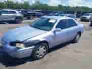 1997 Toyota Camry LE z VIN JT2BF22K2V0021868, wystawiony jako IAAI lot #43070012 z przebiegiem 128 808 mil mil oraz . Historia ofert i sprzedaży dostępna na DreamBid. Obrazek 2.