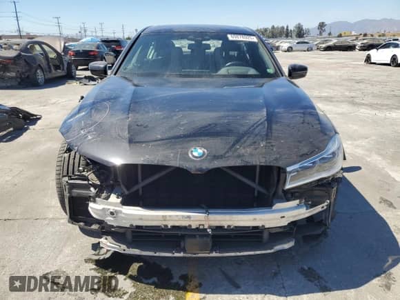 2019 BMW 7 Series 750i with VIN WBA7F0C51KGM26016, listed as a Copart auction lot 69878925 with 61,266 mi miles and Salvage title. Bid and sale history available at DreamBid. Image 5.