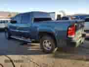 2012 GMC Sierra 1500 Denali with VIN 3GTP1XE28CG125701, listed as a Copart auction lot 86206384 with 116,731 mi miles and Salvage title. Bid and sale history available at DreamBid. Image 2.