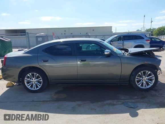 2008 Dodge Charger with VIN 2B3LA43RX8H173304, listed as a IAAI auction lot 41976242 with 150,736 mi miles and . Bid and sale history available at DreamBid. Image 14.