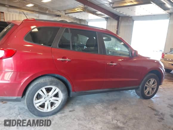 2010 Hyundai Santa Fe Limited z VIN 5NMSK4AG7AH404677, wystawiony jako IAAI lot #43210523 z przebiegiem 167 467 mil mil oraz . Historia ofert i sprzedaży dostępna na DreamBid. Obrazek 13.