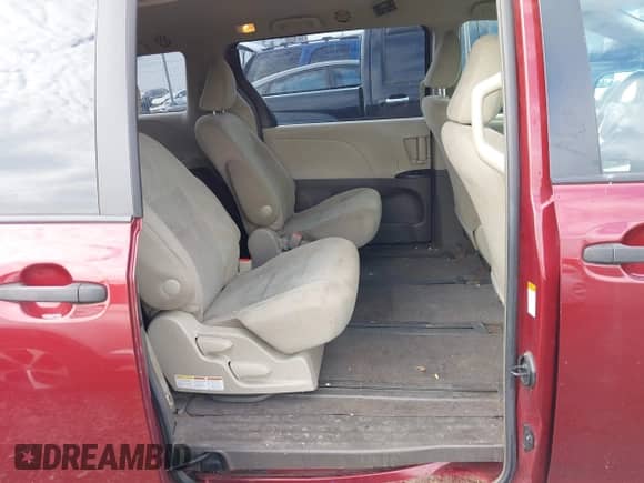 2016 Toyota Sienna L with VIN 5TDZK3DC7GS752874, listed as a IAAI auction lot 42509340 with 100,051 mi miles and . Bid and sale history available at DreamBid. Image 8.