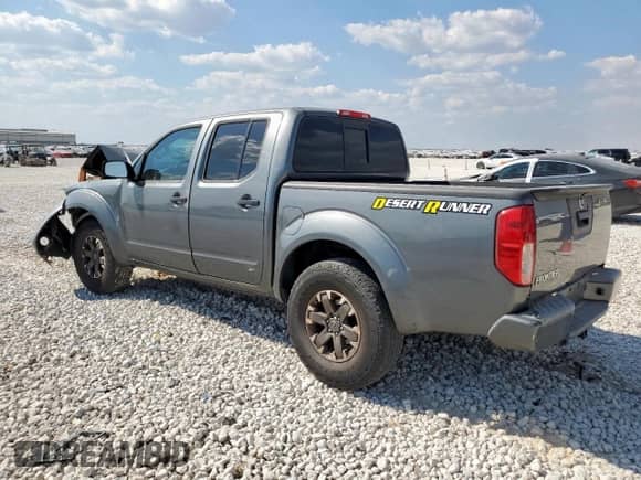 2016 Nissan Frontier Desert Runner z VIN 1N6AD0ER7GN781299, wystawiony jako Copart lot #85112855 z przebiegiem 119 212 mil mil oraz Szkoda całkowita • Salvage title. Historia ofert i sprzedaży dostępna na DreamBid. Obrazek 2.