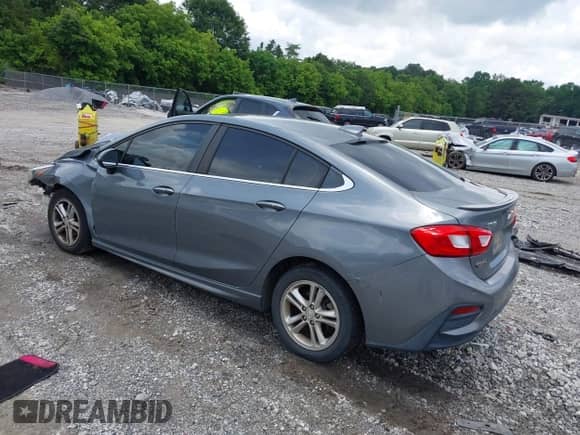 2018 Chevrolet Cruze LT with VIN 1G1BE5SM6J7198916, listed as a IAAI auction lot 42502138 with 179,272 mi miles and . Bid and sale history available at DreamBid. Image 3.