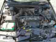 1990 Honda Accord LX z VIN JHMCB7658LC106944, wystawiony jako Copart lot #54325895 z przebiegiem 94 905 mil mil oraz Szkoda całkowita • Salvage title. Historia ofert i sprzedaży dostępna na DreamBid. Obrazek 11.