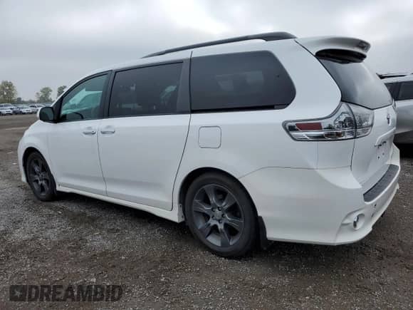 2016 Toyota Sienna SE with VIN 5TDXK3DC6GS760889, listed as a Copart auction lot 82033715 with 208,553 mi miles and Salvage title. Bid and sale history available at DreamBid. Image 2.