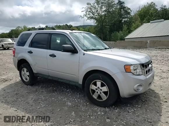 2011 Ford Escape XLT с VIN 1FMCU9DG3BKC58433, выставлен на аукционе Copart как лот 71597035 с пробегом 164 068 миль миль и Чистый • Clean title. История ставок и продаж доступна на DreamBid. Изображение 14.