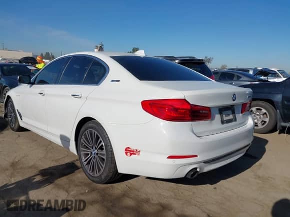 2018 BMW 5 Series 530e with VIN WBAJA9C59JB249087, listed as a IAAI auction lot 42690027 with 70,414 mi miles and . Bid and sale history available at DreamBid. Image 3.