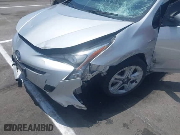 2017 Toyota Prius Two z VIN JTDKARFU0H3042988, wystawiony jako IAAI lot #42580166 z przebiegiem 169 300 mil mil oraz . Historia ofert i sprzedaży dostępna na DreamBid. Obrazek 6.