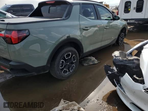 2023 Hyundai Santa Cruz SEL Premium with VIN 5NTJDDAF3PH048478, listed as a Copart auction lot 69555054 with 23,552 mi miles and Salvage title. Bid and sale history available at DreamBid. Image 3.