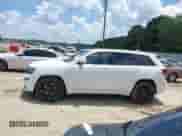 2014 Jeep Grand Cherokee SRT-8 z VIN 1C4RJFDJXEC450402, wystawiony jako IAAI lot #42705334 z przebiegiem 67 372 mil mil oraz . Historia ofert i sprzedaży dostępna na DreamBid. Obrazek 14.