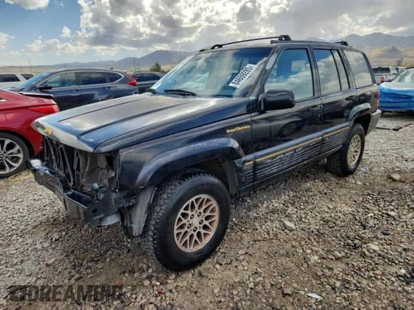 1993 Jeep Grand Cherokee Limited z VIN 1J4GZ78Y5PC544956, wystawiony jako Copart lot #84659285 z przebiegiem 153 945 mil mil oraz Szkoda całkowita • Salvage title. Historia ofert i sprzedaży dostępna na DreamBid. Obrazek 1.