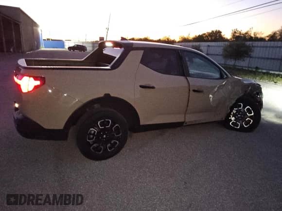 2024 Hyundai Santa Cruz SEL с VIN 5NTJB4AE2RH098952, выставлен на аукционе Copart как лот 80526854 с пробегом 9 783 миль миль и Чистый • Clean title. История ставок и продаж доступна на DreamBid. Изображение 3.