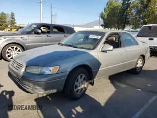 1998 Toyota Camry LE with VIN JT2BF28K8W0092713, listed as a Copart auction lot 71844145 with 256,650 mi miles and Salvage title. Bid and sale history available at DreamBid. Image 1.