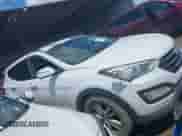 2014 Hyundai Santa Fe z VIN 5XYZUDLAXEG183108, wystawiony jako IAAI lot #42384854 z przebiegiem 160 963 mil mil oraz . Historia ofert i sprzedaży dostępna na DreamBid. Obrazek 14.