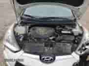 2013 Hyundai Veloster w/Black Int z VIN KMHTC6AD6DU145921, wystawiony jako Copart lot #68556835 z przebiegiem 91 117 mil mil oraz Szkoda całkowita • Salvage title. Historia ofert i sprzedaży dostępna na DreamBid. Obrazek 11.