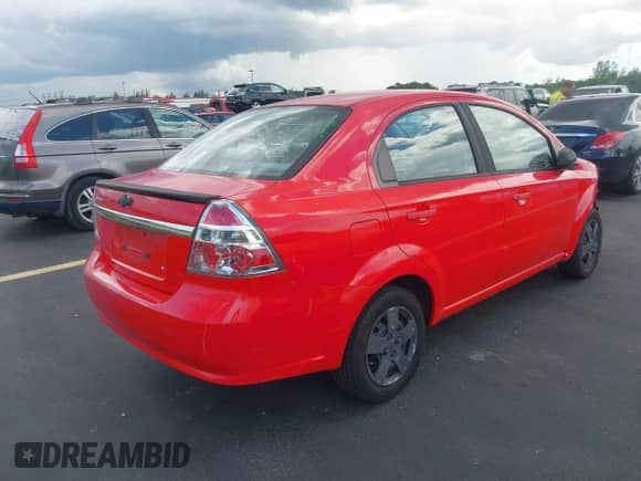 2011 Chevrolet Aveo 1LT z VIN KL1TD5DE4BB159851, wystawiony jako IAAI lot #42799582 z przebiegiem 141 562 mil mil oraz . Historia ofert i sprzedaży dostępna na DreamBid. Obrazek 4.