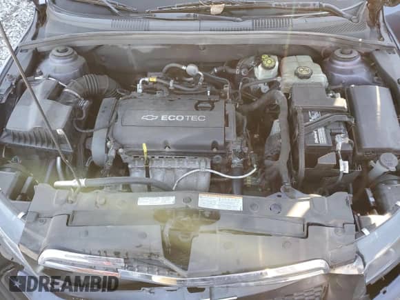 2014 Chevrolet Cruze LS z VIN 1G1PA5SH7E7392669, wystawiony jako Copart lot #85942515 z przebiegiem 141 483 mil mil oraz Czysty tytuł • Clean title. Historia ofert i sprzedaży dostępna na DreamBid. Obrazek 11.