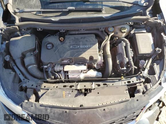 2018 Chevrolet Cruze LT z VIN 3G1BE6SM5JS573833, wystawiony jako Copart lot #70338185 z przebiegiem 90 711 mil mil oraz Szkoda całkowita • Salvage title. Historia ofert i sprzedaży dostępna na DreamBid. Obrazek 11.