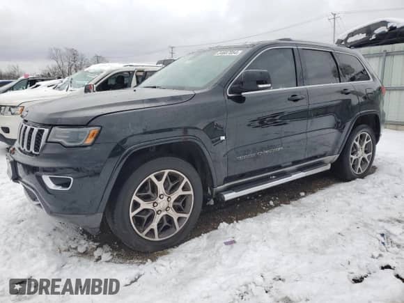 2018 Jeep Grand Cherokee Sterling with VIN 1C4RJFBT5JC121010, listed as a Copart auction lot 84887054 with 96,528 mi miles and Salvage title. Bid and sale history available at DreamBid. Image 1.