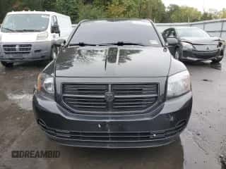 2010 Dodge Caliber SXT с VIN 1B3CB4HA3AD536125, выставлен на аукционе Copart как лот 73112264 с пробегом 128 020 миль миль и Списание • Salvage title. История ставок и продаж доступна на DreamBid. Изображение 5.