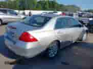 2006 Honda Accord EX-L with VIN 1HGCM66576A009760, listed as a IAAI auction lot 42995684 with 93,912 mi miles and . Bid and sale history available at DreamBid. Image 4.