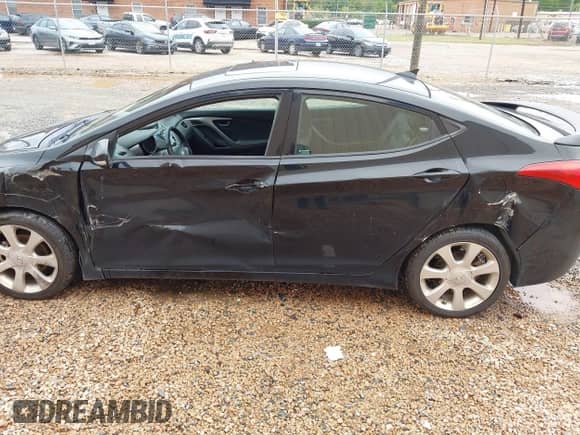2013 Hyundai Elantra GLS with VIN KMHDH4AE7DU728890, listed as a IAAI auction lot 40365489 with 230,693 mi miles and . Bid and sale history available at DreamBid. Image 6.