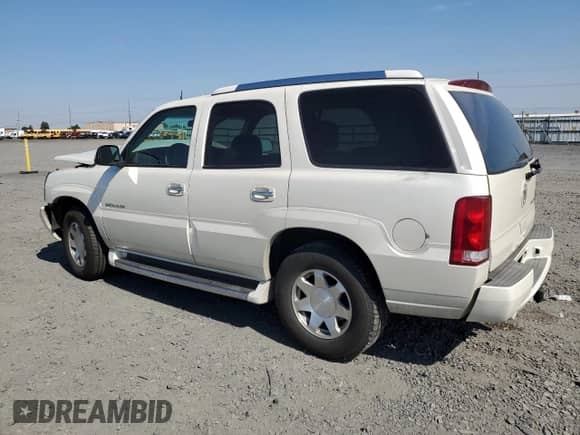 2004 Cadillac Escalade with VIN 1GYEC63T54R309965, listed as a Copart auction lot 64319945 with 121,284 mi miles and Salvage title. Bid and sale history available at DreamBid. Image 2.